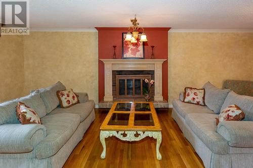 3606 Old Okanagan Highway, West Kelowna, BC - Indoor Photo Showing Living Room With Fireplace