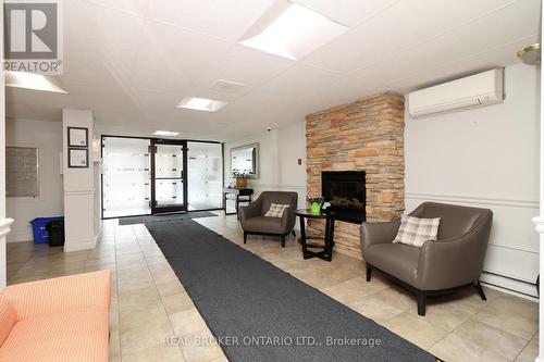 1005 - 64 Benton Street, Kitchener, ON - Indoor With Fireplace