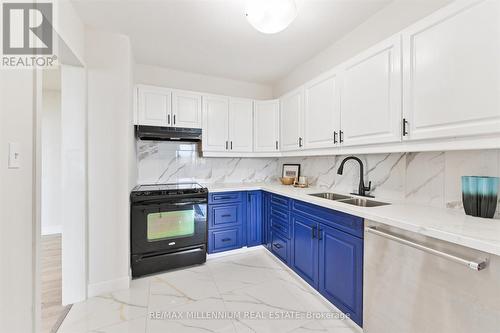1405 - 14 Neilson Drive, Toronto, ON - Indoor Photo Showing Kitchen With Double Sink