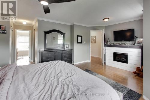 93 Holly Meadow Road, Barrie, ON - Indoor Photo Showing Bedroom With Fireplace