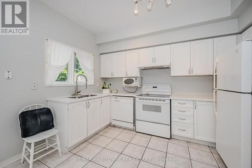 24 Bluewater Court, Toronto, ON - Indoor Photo Showing Kitchen With Double Sink