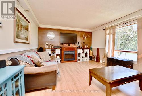 1400 Old Muskoka Road, Huntsville, ON - Indoor Photo Showing Living Room With Fireplace