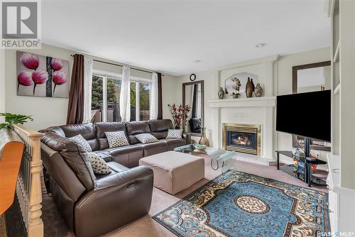 318 Blackthorn Crescent, Saskatoon, SK - Indoor Photo Showing Living Room With Fireplace