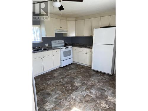 74 4625 Graham Avenue, Terrace, BC - Indoor Photo Showing Kitchen With Double Sink