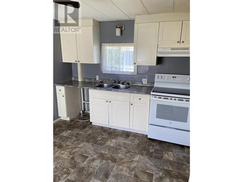 74 4625 Graham Avenue, Terrace, BC - Indoor Photo Showing Kitchen With Double Sink