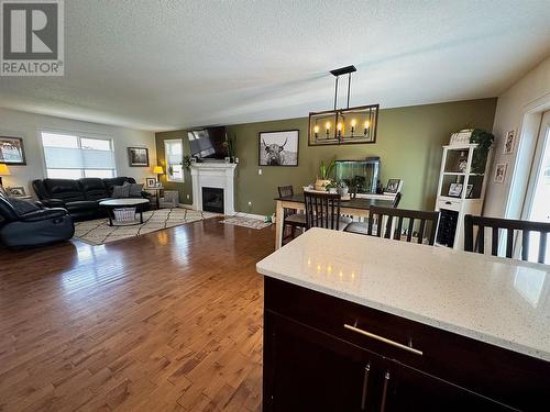 909 89 Avenue, Dawson Creek, BC - Indoor Photo Showing Living Room With Fireplace