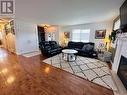 909 89 Avenue, Dawson Creek, BC  - Indoor Photo Showing Living Room With Fireplace 