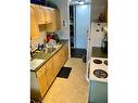 301 - 2126 68Th Avenue, Grand Forks, BC  - Indoor Photo Showing Kitchen With Double Sink 