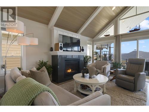 6971 Terazona Drive Lot# 439, Fintry, BC - Indoor Photo Showing Living Room With Fireplace