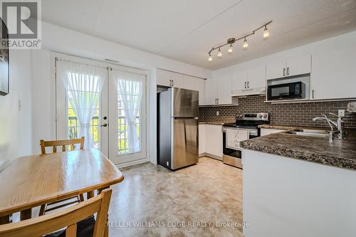 312 - 2035 Appleby Line, Burlington, ON - Indoor Photo Showing Kitchen With Upgraded Kitchen