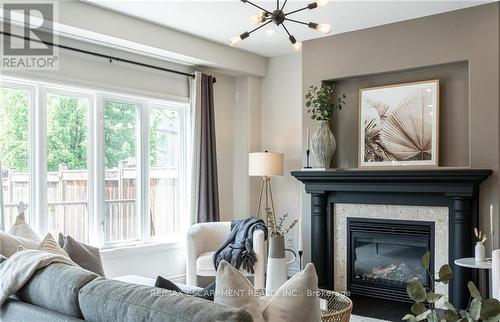 199 Festival Way, Hamilton, ON - Indoor Photo Showing Living Room With Fireplace