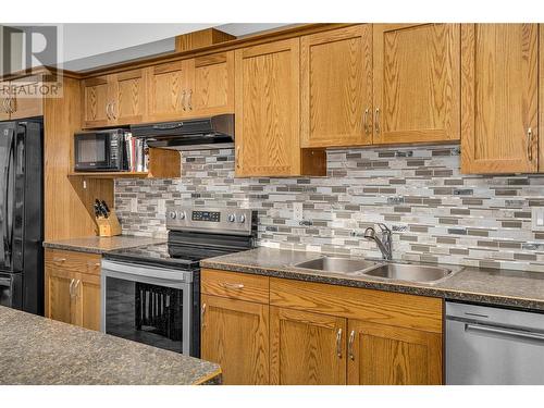 1905 Pandosy Street Unit# 209, Kelowna, BC - Indoor Photo Showing Kitchen With Double Sink