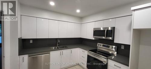 104 - 333 Clark Avenue W, Vaughan, ON - Indoor Photo Showing Kitchen With Double Sink