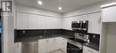 104 - 333 Clark Avenue W, Vaughan, ON  - Indoor Photo Showing Kitchen With Double Sink 