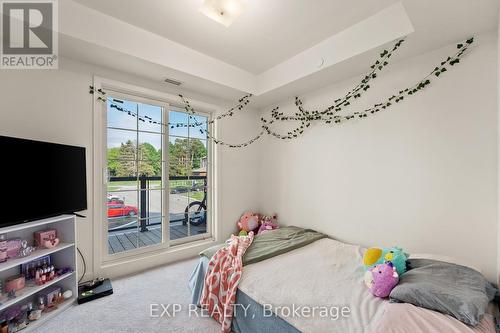 211 - 110 Grew Boulevard, Georgina, ON - Indoor Photo Showing Bedroom