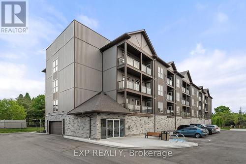 211 - 110 Grew Boulevard, Georgina, ON - Outdoor With Balcony