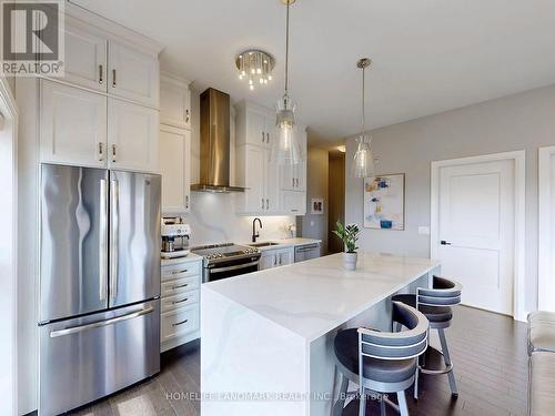 622 - 102 Grovewood Common, Oakville, ON - Indoor Photo Showing Kitchen With Upgraded Kitchen