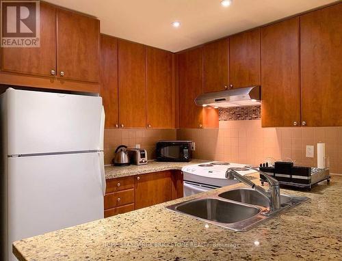 908 - 85 Bloor Street E, Toronto, ON - Indoor Photo Showing Kitchen With Double Sink