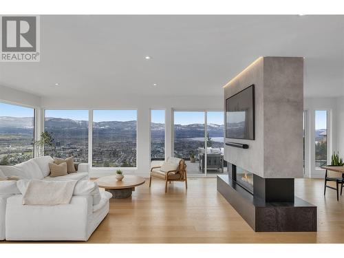 1190 Stoneypointe Court, Kelowna, BC - Indoor Photo Showing Living Room With Fireplace