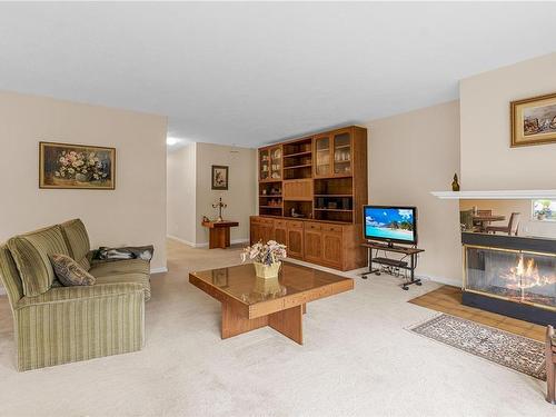 31-5110 Cordova Bay Rd, Saanich, BC - Indoor Photo Showing Living Room With Fireplace