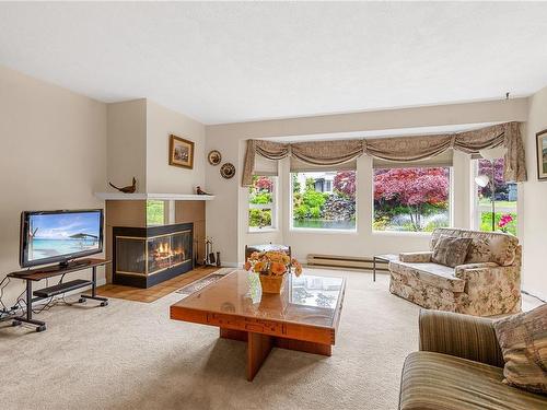 31-5110 Cordova Bay Rd, Saanich, BC - Indoor Photo Showing Living Room With Fireplace