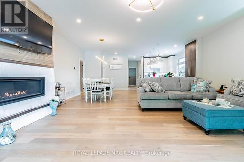 13 - 300 Richmond Street, Thorold, ON - Indoor Photo Showing Living Room With Fireplace