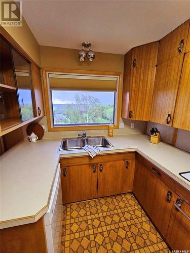 Bailey Acreage, Laporte, SK - Indoor Photo Showing Kitchen With Double Sink