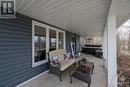 Imagine enjoying your morning coffee or afternoon cocktail on this covered verandah - 171 Gardiner Shore Road, Carleton Place, ON  - Outdoor With Deck Patio Veranda With Exterior 