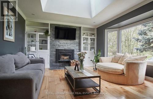 42 Pigeon Lake Road, Kawartha Lakes, ON - Indoor Photo Showing Living Room With Fireplace