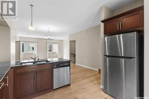 212 212 Willis Crescent, Saskatoon, SK - Indoor Photo Showing Kitchen With Double Sink