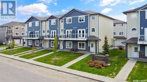 212 212 Willis Crescent, Saskatoon, SK - Outdoor With Balcony With Facade