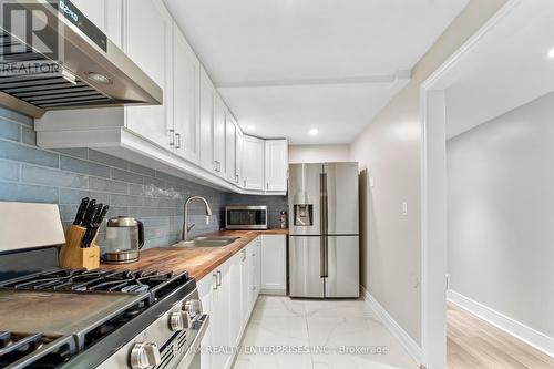 3607 Swirlingleaves Crescent, Mississauga, ON - Indoor Photo Showing Kitchen With Double Sink