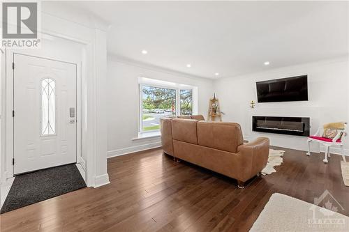 1632 Drake Avenue, Ottawa, ON - Indoor Photo Showing Living Room With Fireplace