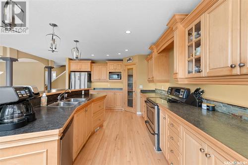 233 Wood Lily Drive, Moose Jaw, SK - Indoor Photo Showing Kitchen With Double Sink