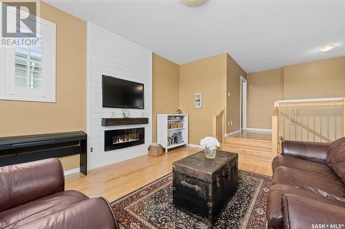 233 Wood Lily Drive, Moose Jaw, SK - Indoor Photo Showing Living Room With Fireplace