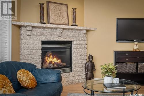 233 Wood Lily Drive, Moose Jaw, SK - Indoor Photo Showing Living Room With Fireplace