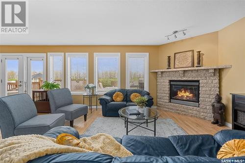 233 Wood Lily Drive, Moose Jaw, SK - Indoor Photo Showing Living Room With Fireplace