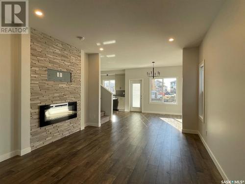 316 Pepper Place, Saskatoon, SK - Indoor Photo Showing Other Room With Fireplace