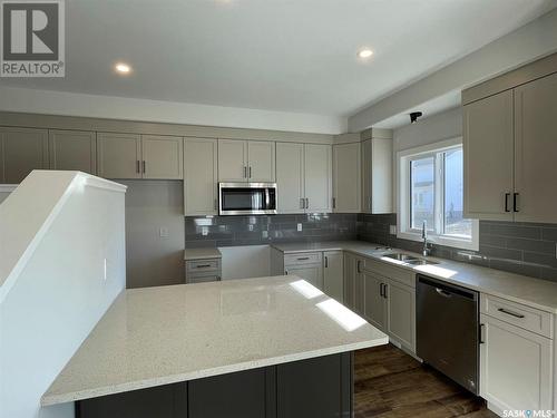 316 Pepper Place, Saskatoon, SK - Indoor Photo Showing Kitchen With Double Sink