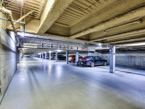 Garage - 303-25 Av. Ernest-Rochette, La Prairie, QC - Indoor Photo Showing Garage