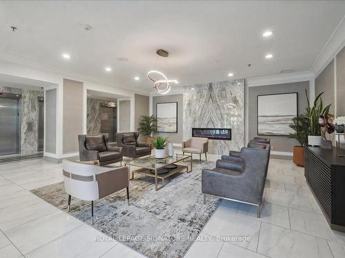 710-75 King St E, Mississauga, ON - Indoor Photo Showing Living Room With Fireplace