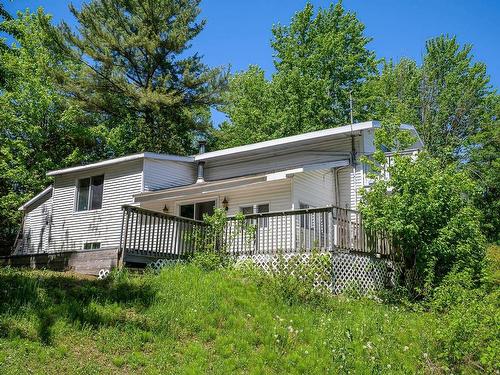 Back facade - 546 6E Avenue Lac-Capri, Saint-Colomban, QC - Outdoor With Deck Patio Veranda