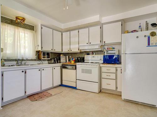 Cuisine - 546 6E Avenue Lac-Capri, Saint-Colomban, QC - Indoor Photo Showing Kitchen With Double Sink