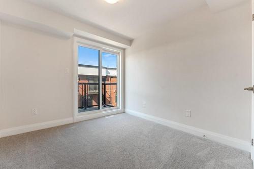 Bedroom With Balcony - 2 Willow Street|Unit #73, Paris, ON - Indoor Photo Showing Other Room