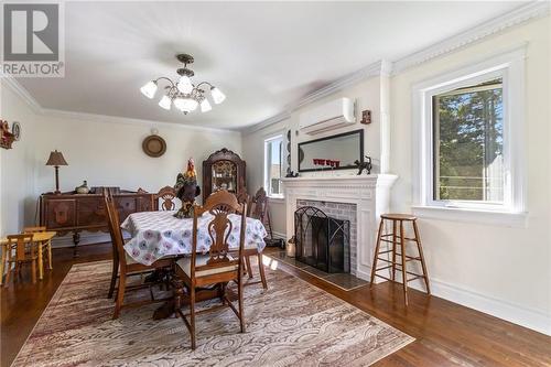 6 Dundas, Saint-Antoine, NB - Indoor Photo Showing Dining Room With Fireplace