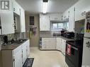 1662 102Nd Street, North Battleford, SK  - Indoor Photo Showing Kitchen With Double Sink 