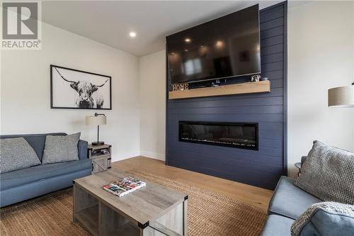 3 Heros Crt, Moncton, NB - Indoor Photo Showing Living Room With Fireplace