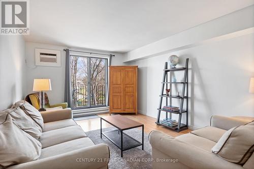 304 - 3355 Sandwich Street, Windsor, ON - Indoor Photo Showing Living Room