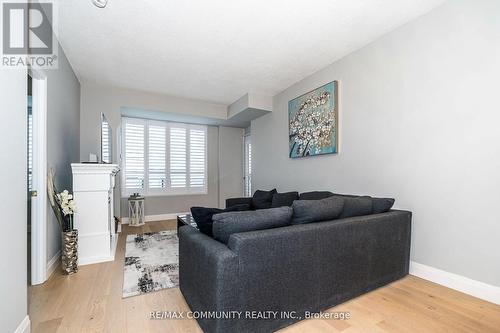 718 - 16 Dallimore Circle, Toronto, ON - Indoor Photo Showing Living Room