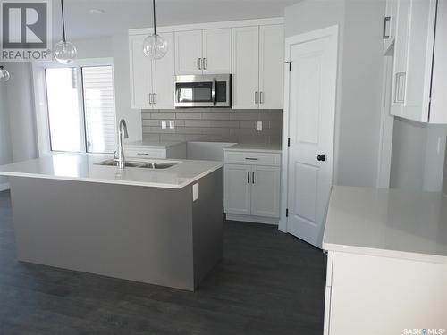 318 Pepper Place, Saskatoon, SK - Indoor Photo Showing Kitchen With Double Sink